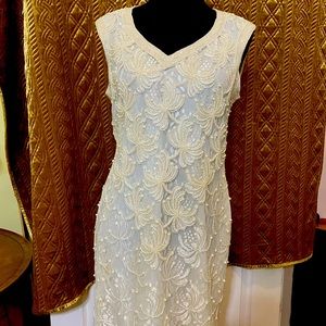 Brand new beaded dress with firework designs. Never worn. Classic!